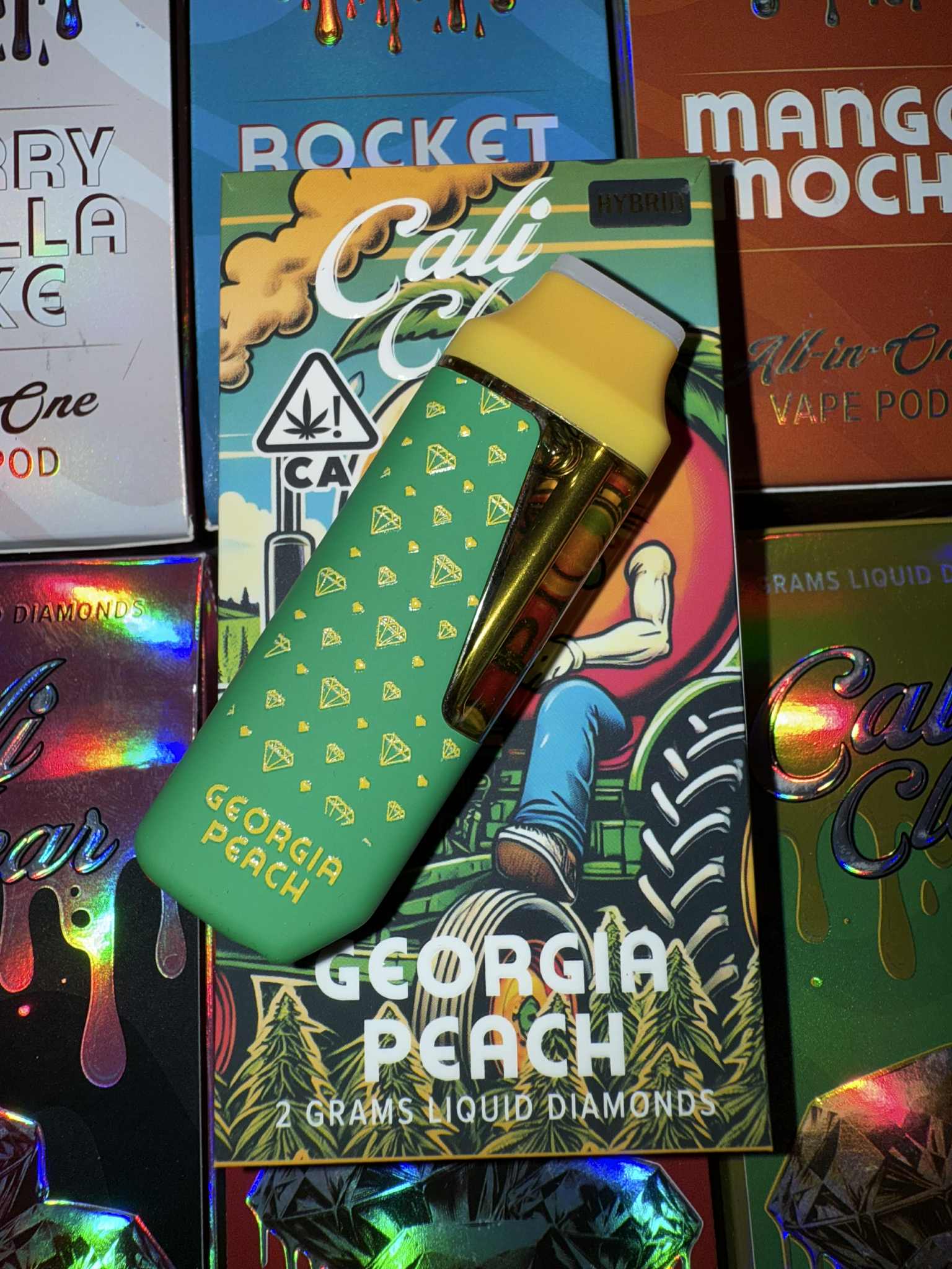 Cali Clear Georgia Peach 2g Disposable Vape featuring juicy peach flavor, smooth fruit profile, dual chamber technology, long-lasting 2G capacity, and premium Cali Clear build quality.